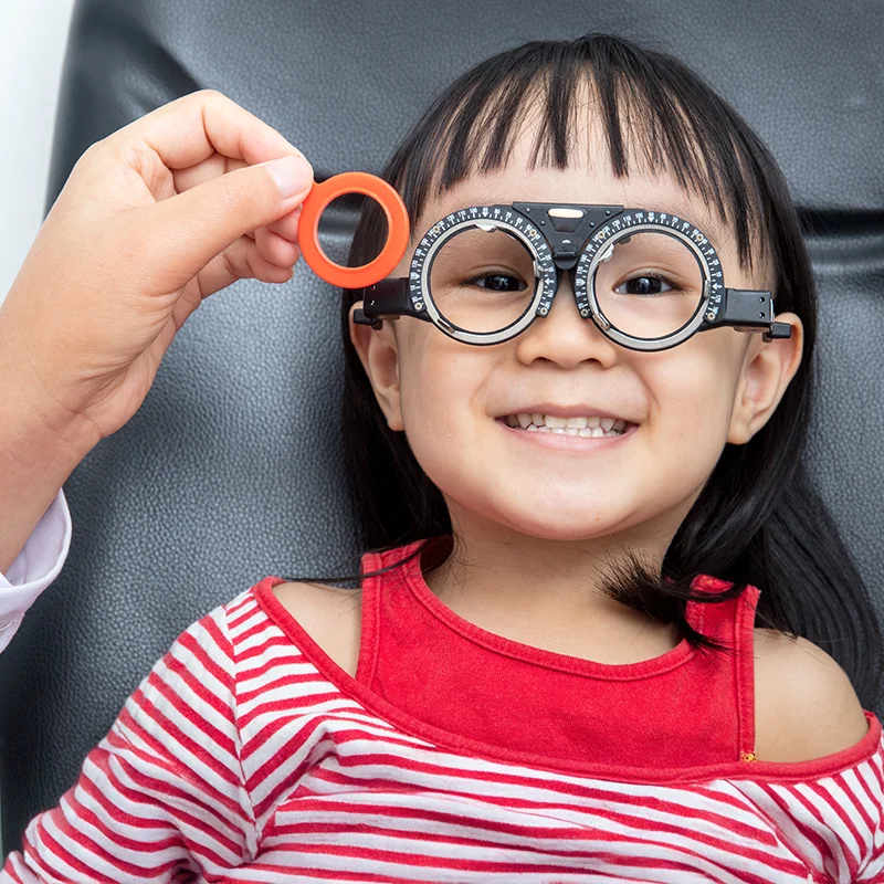 Young girl being tested or myopia